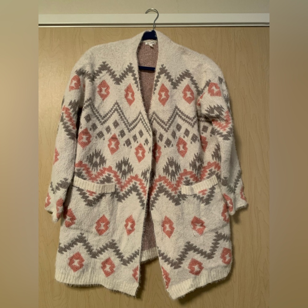 En crème cardigan size medium. Hardly worn
